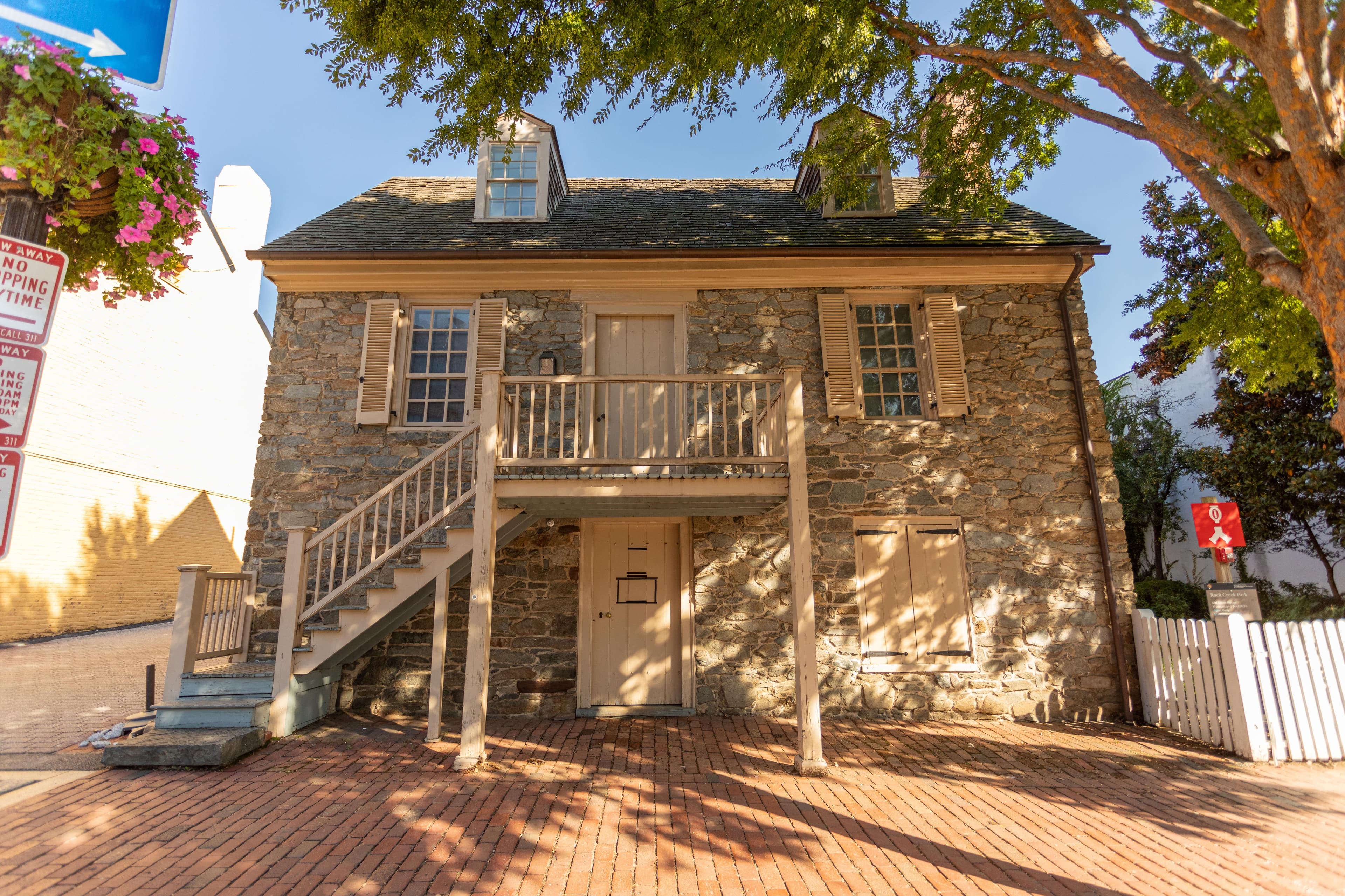 a two story stone building
